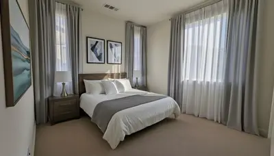a bedroom with a large bed with white pillows at 4 Bed Large House in San Diego Amazing Amenities in Chula Vista