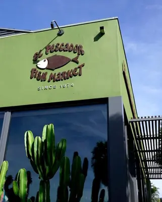 a sign for a fast food market with a cactus at La Jolla Village Escape - Walk to Everything in San Diego