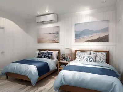 a bedroom with two beds and a beach at Newport Beach Oceanside Stay in Newport Beach