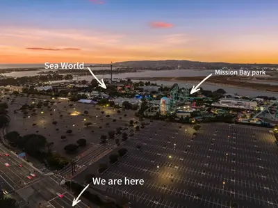 an aerial view of a parking lot with a city at Luxury 2BR Apartment Near SeaWorld, Airport & Downtown San Diego in San Diego