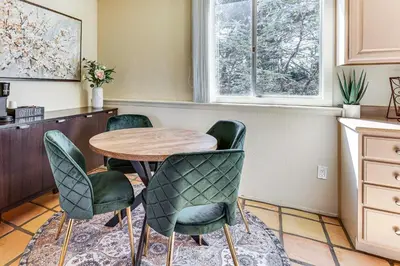 a kitchen with a table and four chairs at Hike, Sip and Explore Couples Retreat in Fallbrook in Fallbrook