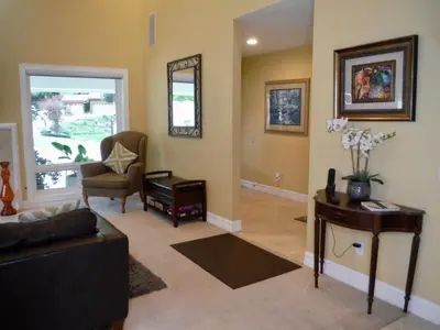 a living room with a couch and a table at Bella Vita Gated Resort in Escondido