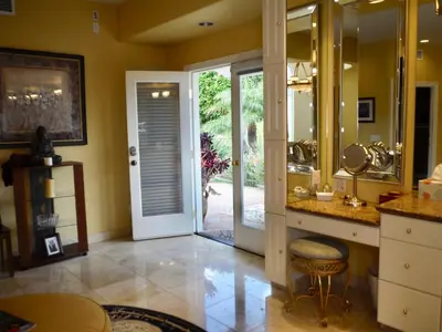 a bathroom with a sink and a mirror at Bella Vita Gated Resort in Escondido