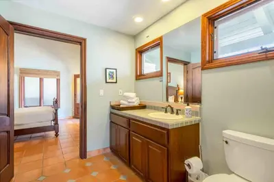 a bathroom with a sink and a toilet at Fallbrook Vineyard Estate in Fallbrook