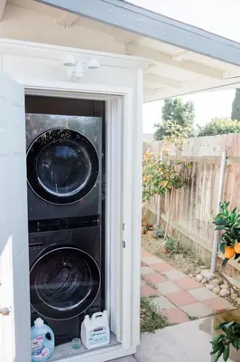 a washer and dryer inside of a house at Mira Mesa Private Suite with Private Bath & Entry #1 in San Diego