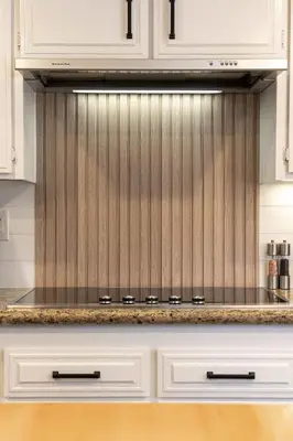 a kitchen with white cabinets and a stove top oven at Luxury Oasis Valley Views Gameroom Villa in Vista