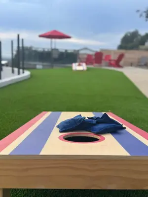 a wooden table with a blue shirt sitting on top at Luxury Oasis Valley Views Gameroom Villa in Vista