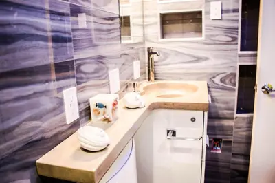 a bathroom with a sink and a counter top at Entire Mission Beach Duplex Steps 2 the Ocean & Bay 2 Parking Spots in San Diego
