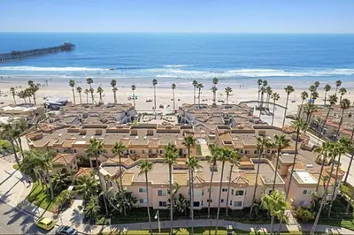 an aerial view of a resort with the beach at 5N-31 Beach View BBQ & Jacuzzi in Oceanside
