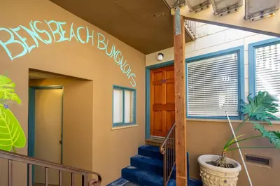 a building with a sign that reads benson exchange at Ben's Beach Bungalow 1 150 Steps to Sand in San Diego