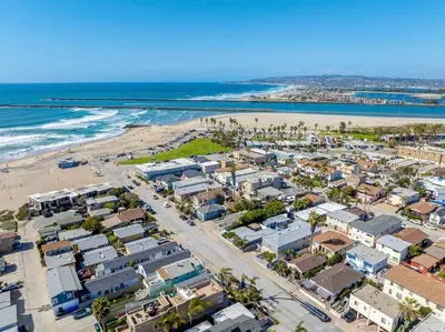 an aerial view of a beach with houses and the ocean at The Sweet Escape for 2 in San Diego