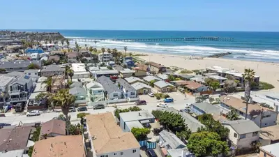 an aerial view of a beach with houses and the ocean at The Sweet Escape for 2 in San Diego