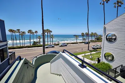 a balcony of a house with a view of the beach at 152-6 S Pacific Fantastic Ocean View in Oceanside