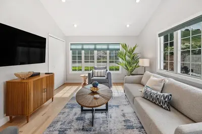 a living room with a couch and a table at Designer Canyon House in La Jolla in San Diego