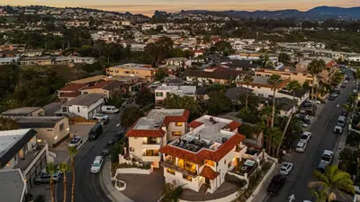 an aerial view of a city with houses at Steps to the Beach Modern 3BDR w Patio 257 Trailhead Trestles 1 by AvantStay in San Clemente