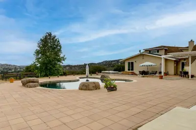 a courtyard with a swimming pool in a house at Near Hiking Trails! Luxe Family Home in Lakeside in Lakeside