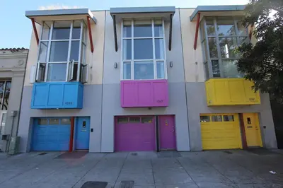 a building with brightly colored doors and windows at Stunning 4 BR 3 BA Convention Center Gaslamp Petco in San Diego