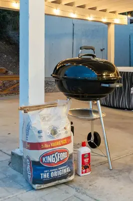 a bbq grill and a bag of food and a container at Entire Private Home with 4 Bedrooms 2 Bathrooms, 6 Beds, Hot Tub, King Bed, 6 Parking, Big Yard, Available Now in Spring Valley
