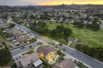 an aerial view of a suburb with houses at Entire Private Home with 4 Bedrooms, Pool, Hot Tub, King Bed, Garage, Available Now in El Cajon