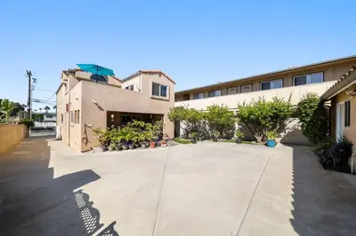 an empty courtyard in front of a building at Hot Tub Ocean Views 3 Bedroom Private Home in Carlsbad
