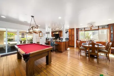 a kitchen with a pool table in the middle of a room at Hot Tub Ocean Views 3 Bedroom Private Home in Carlsbad