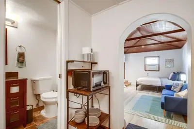 a small room with a bathroom and a living room at Coastal SD Retreat Studio Pets Close to Ocean in San Diego