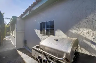 a grill sitting on the side of a building at Coastal SD Retreat Studio Pets Close to Ocean in San Diego