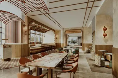a restaurant with wooden tables and chairs in a room at Le Méridien San Diego Downtown in San Diego