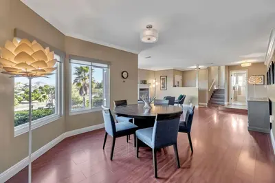 a dining room with a table and chairs at The Zen House Temecula in Temecula