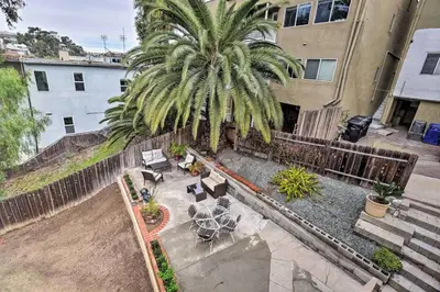 an overhead view of a patio with a palm tree at Apt in San Diego in San Diego
