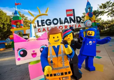 a group of lego people standing in front of legoland calorld at Central Spot - 4 Min to Waterpark, Dining & Shops in Vista