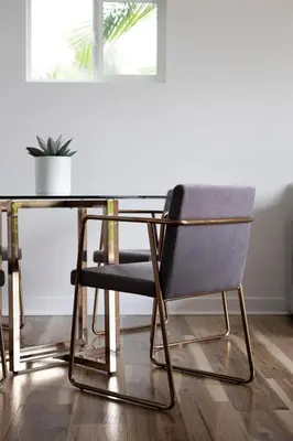 a dining room table with a chair and a table at SoCal Living w/ Pool, hot tub and movie theater in San Diego