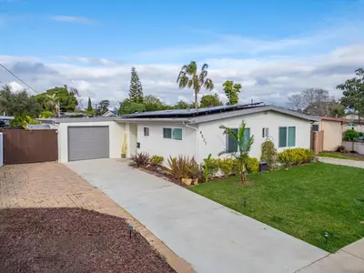 a white house with a driveway and a yard at San Diego Private Pool Oasis Modern 3BR 2BA in San Diego