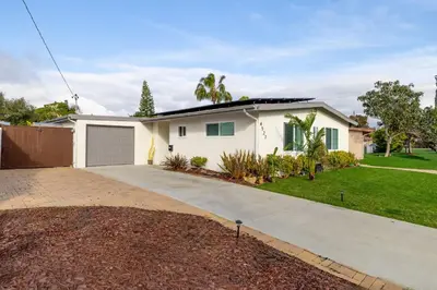 a white house with a driveway at San Diego Private Pool Oasis Modern 3BR 2BA in San Diego