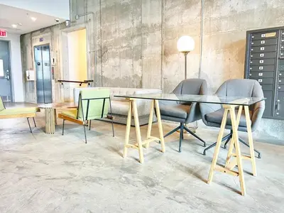 a dining room with a glass table and chairs at Urban Oasis w Rooftop Views Heart of San Diego in San Diego