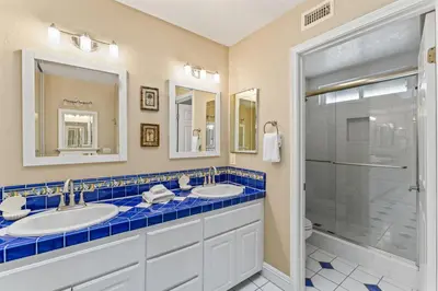a bathroom with two sinks and a shower at Coastal Duo Steps to Wedding Venues Beach Ole Hanson Casino in San Clemente