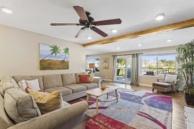 a living room with a couch and a ceiling fan at Bright 3BR Beach Condo Near Casino and Ole Hanson in San Clemente
