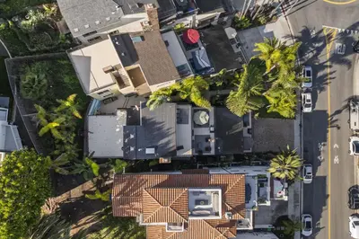 an overhead view of a house with palm trees at Tropical 2BR Retreat Walk to Beach Wedding Venues Large Deck in San Clemente