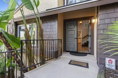 a front door of a house with a porch at Tropical 2BR Retreat Walk to Beach Wedding Venues Large Deck in San Clemente