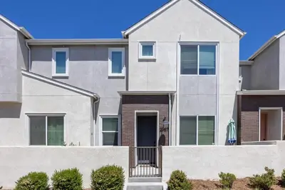 an image of a house with a fence at Chula Vista 3BR with Children's Playroom, Pool, Park and Sleeps 9 in Chula Vista