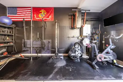 a room with a gym with an american flag at Chula Vista 3BR with Children's Playroom, Pool, Park and Sleeps 9 in Chula Vista