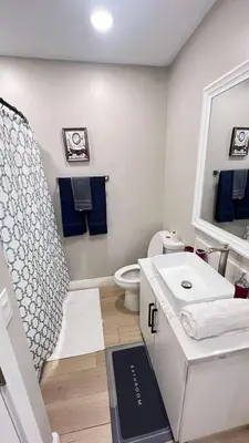 a white bathroom with a sink and a toilet at 8354 Adam Unit B 1Bed 1Bath by SD Stay in Lemon Grove