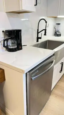 a kitchen with a sink and a counter top at Gillespie 1059 B 3Bed 2bath by SD Stay in Spring Valley