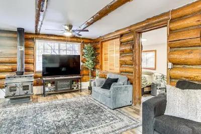 a living room with a television and a couch at MTB Base Camp! Rustic Cabin By Mt Laguna Trails in Mount Laguna