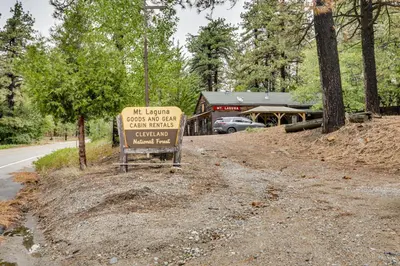 a sign on the side of a road with a building at MTB Base Camp! Rustic Cabin By Mt Laguna Trails in Mount Laguna