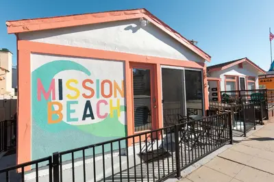 a small building with a mission beach sign on it at Beach to Bay The Ultimate SD location in San Diego