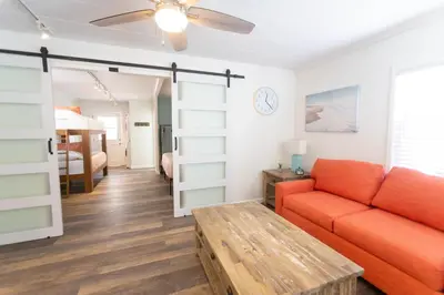 a living room with a couch and a table at Beach to Bay The Ultimate SD location in San Diego