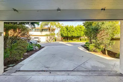 a view of a walkway through a building at Spectacular Ocean View! Luxe Condo in San Clemente in San Clemente