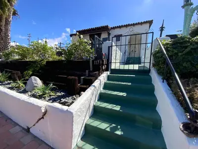 a set of stairs leading to a house at Casa Cabrillo in San Clemente