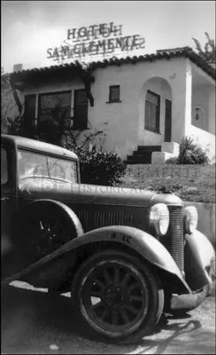 an old car is parked in front of a hotelasyasyasyasy at Casa Cabrillo in San Clemente